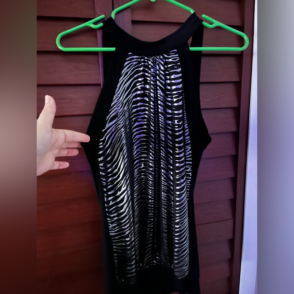 Size XL, black & silver, zebra-like, stretchy top with a tie in the back